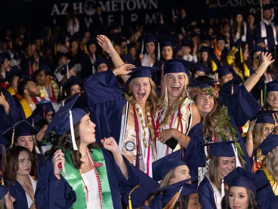 graduates celebrate at commencement
